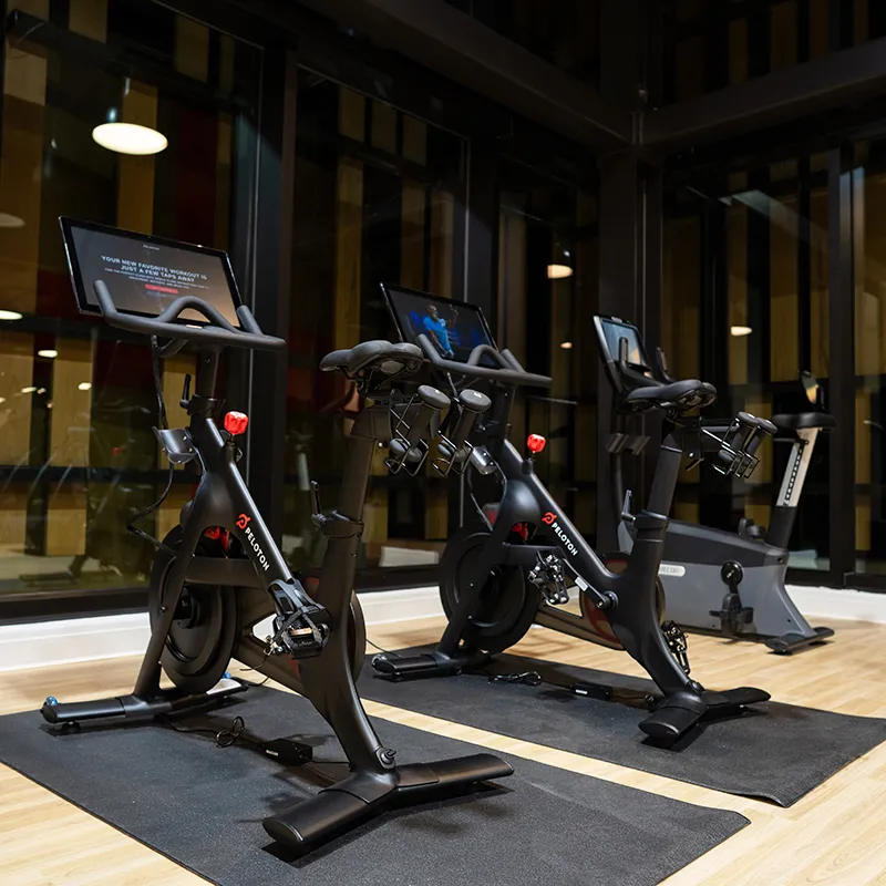Peloton Bikes in Fitness Center An image of Peloton bikes available to use in the Fitness Center with The Landing at Evermore Orlando Resort.